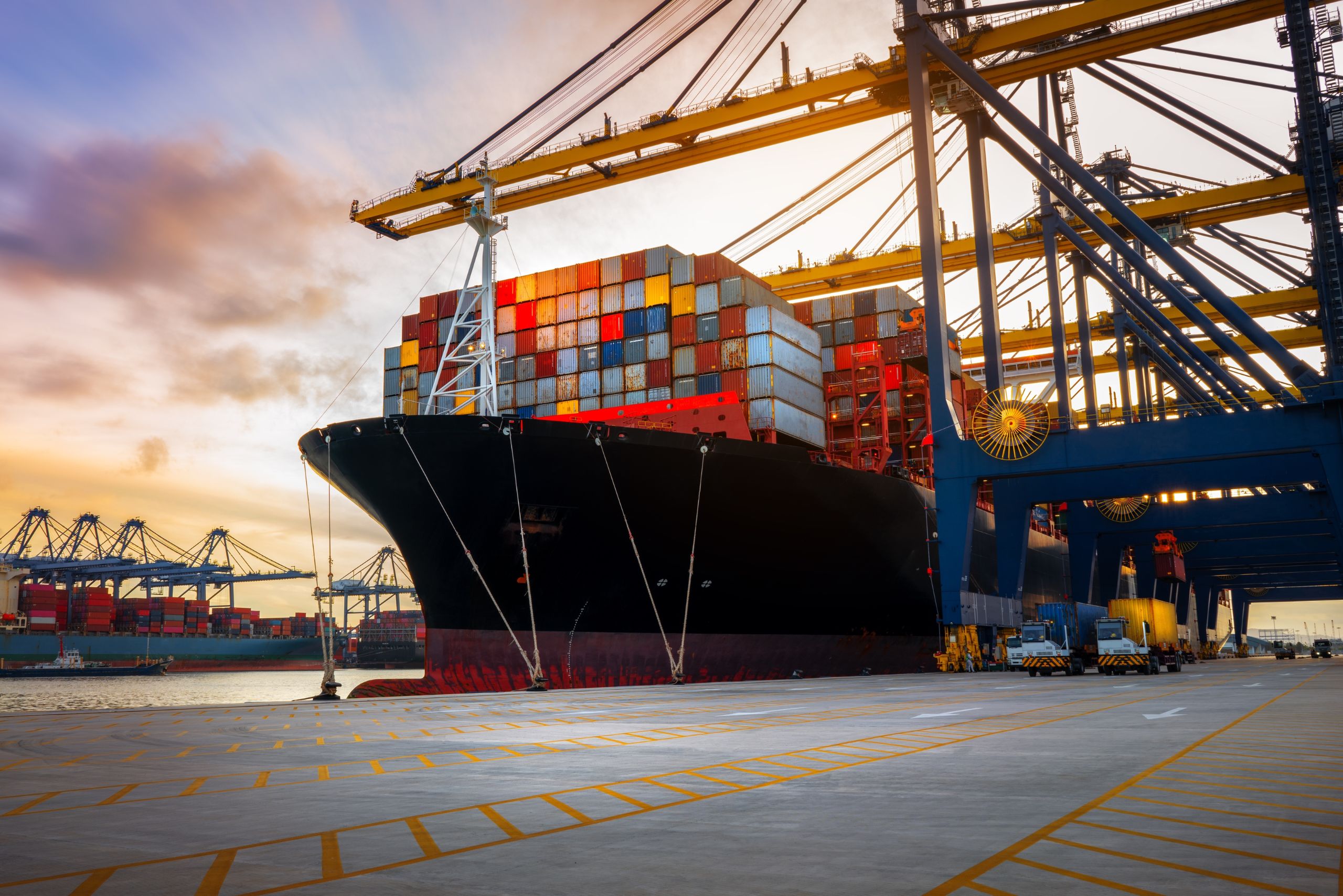 ship in harbour port loading containers