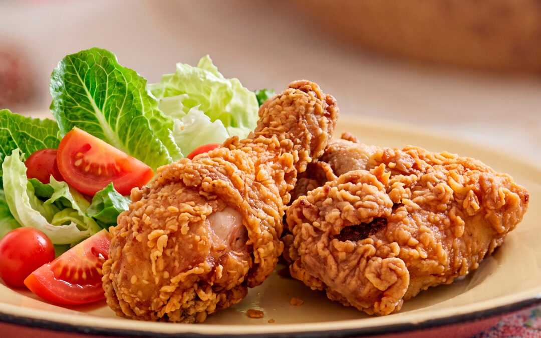 Crispy fried chicken with green salad